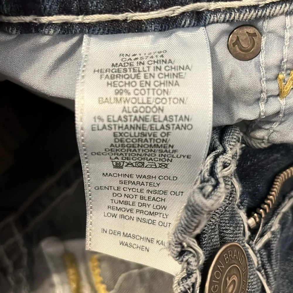Men’s Blue Skinny True Religion Jeans with Faded Vintage Look